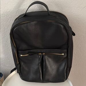 Black Leather Backpack with Gold Accents